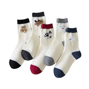 Thickened warm wool socks for women with cute cartoon embroidery and color-blocked socks.
