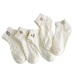 White cotton low-cut boat socks for women, cute embroidered short socks with sweet design.