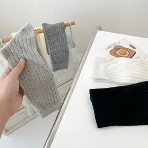 Detail view of casual vertical striped women socks in classic colors for summer daily wear.