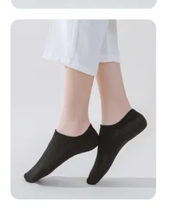 Detail view of black ribbed women's boat socks, showing shallow cut and comfortable fit.
