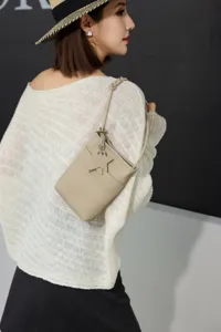 Genuine leather mini crossbody phone bag with stylish star charm for women daily fashion