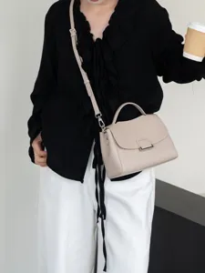 Elegant leather top-handle crossbody bag for women, minimalist daily shoulder bag in gray.