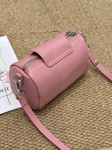 Rosa Leder zylindrische Umhängetasche stilvolle Handtasche für Damen Mode Alltag.