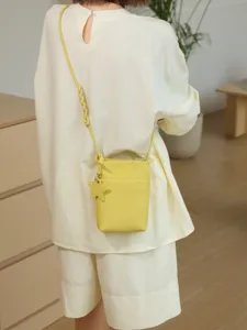 Genuine leather mini crossbody phone bag for women, stylish yellow shoulder bag with star charm