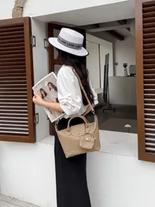 Stylish khaki leather shoulder bag for women, premium genuine leather casual tote with small pouch.