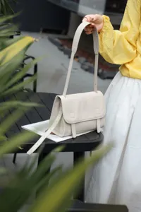 Top layer cowhide casual messenger bag for women, stylish commuting shoulder cross-body bag.