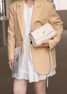 Echtleder Handtasche Umhängetasche für Damen, elegante kleine Schultertasche mit Drehverschluss.