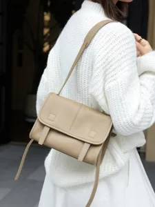 Genuine leather messenger bag for women, stylish crossbody shoulder handbag for daily commuting.