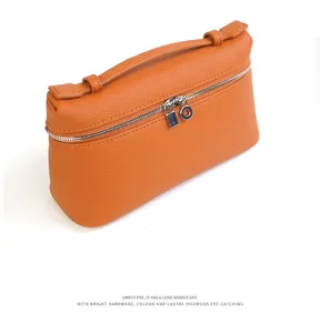 Borsa a mano in vera pelle arancione, elegante mini borsa a tracolla con finiture in metallo argentato.