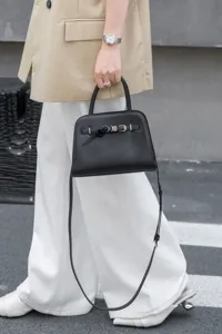 Stylish genuine leather women handbag, minimalist casual crossbody top handle bag for daily commute.