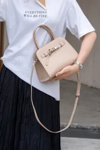 Beige genuine leather top-handle handbag, elegant minimalist commuter crossbody bag for women.
