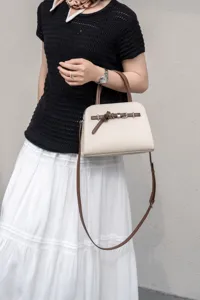 Commuter leather shoulder crossbody handbag detail showing stylish design and premium quality.
