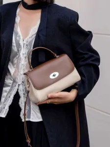 Echte Leder Umhängetasche für Damen, stilvolle zweifarbige kleine Handtasche mit Henkel.