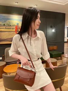 Stylish vintage leather messenger bag for women, classic brown crossbody bag for daily work.