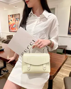 Chic vintage leather satchel handbag for women, stylish top-handle crossbody bag for commute.