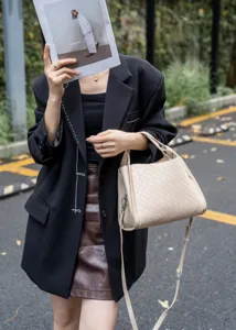 Chic beige woven leather shoulder crossbody basket bag for women, stylish daily wear.