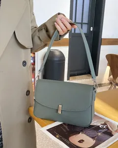 Trendy sage green genuine leather shoulder bag for women, elegant flap design with metal lock.