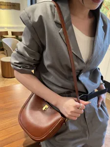 Women's genuine leather saddle bag chic vintage crossbody shoulder bag for daily use today.