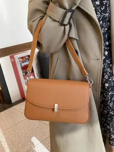Classic brown leather shoulder bag for women, elegant daily crossbody bag with metal lock.