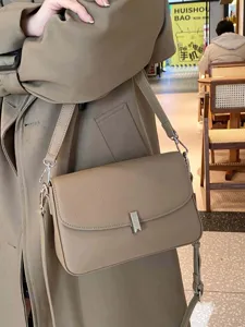 Classic genuine leather crossbody shoulder bag for women, versatile daily fashion designer purse.