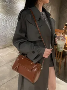 Women's vintage brown leather Boston shoulder bag, fashionable daily crossbody handbag.