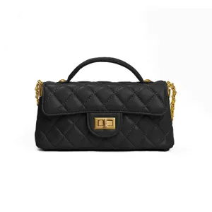 Black quilted leather top handle bag with chain strap and turn-lock closure, main view.