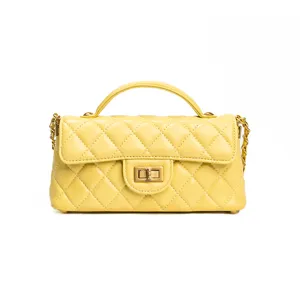 Yellow quilted leather handbag with top handle and gold chain strap for women main view