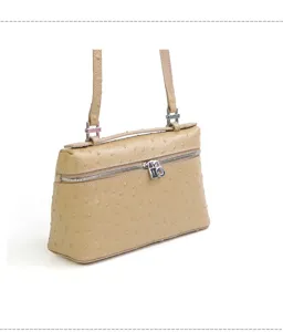Detailed view of genuine leather ostrich pattern lunch box handbag, stylish shoulder bag.