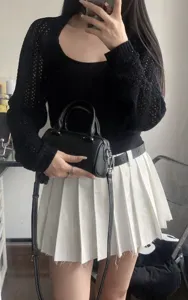 Black leather mini Boston bag for women, stylish top handle handbag and crossbody bag.