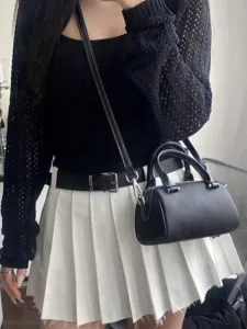 Black leather Boston bag for women, trendy small crossbody shoulder bag with top handles.