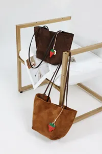 Brown suede tote bag for women, large capacity shoulder bag with cute strawberry charm design.