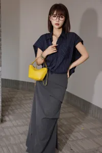 Genuine leather minimalist mini crossbody bag for women, stylish yellow shoulder bag.
