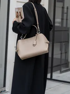 Premium leather shoulder bag for women, large capacity commuter handbag, chic niche style.