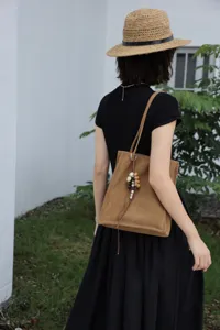 Genuine leather minimalist brown tote bag with bead charms, perfect for daily commuting and office.