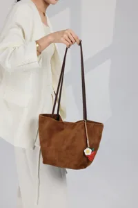 Brown suede tote bag, large capacity minimalist shoulder bag for women detail view.