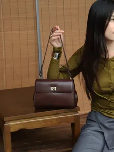 Genuine leather retro shoulder bag for women, classic brown commute tote bag with metal lock.