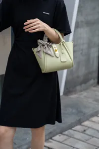 Borsa a mano elegante da donna tracolla borsa a secchiello estate moda chic design borsa.