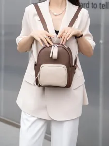 Elegante zainetto mini in pelle bicolore da donna, perfetto per il commuting e viaggi leggeri.