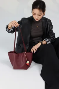 Genuine leather tote bag large capacity shoulder bucket bag for women with cute strawberry charm