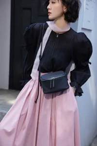 Black genuine leather crossbody bag, minimalist mini camera bag and phone pouch for daily wear.