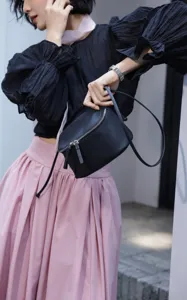 Genuine leather mini crossbody bag for women, stylish minimalist lunch box shoulder bag.