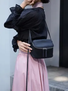 Minimalist genuine leather crossbody mini box bag for women, stylish daily shoulder travel bag.