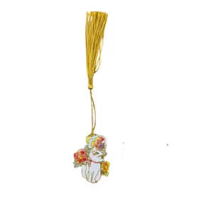 Metal cat bookmark with golden tassel, detailed closeup of the exquisite floral design.