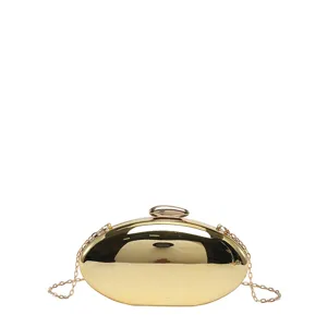 Gold acrylic mango shaped clutch bag with chain strap for evening party stylish women