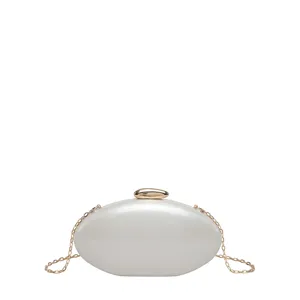 Elegant pearl acrylic oval clutch bag with gold chain strap for women evening party