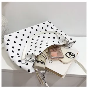 Sac a bandouliere a pois detail interieur et capacite pour un style quotidien unique.