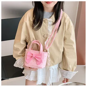 Rosa Pünktchen Kinder Handtasche mit großer Schleife, süße Mini Umhängetasche für kleine Mädchen.
