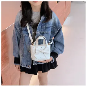 Kinder Handtasche mit Punkten und Schleife, süße Mini-Umhängetasche für Mädchen.