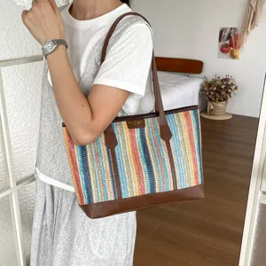 Colorful woven straw tote bag with brown leather trim, large capacity summer beach bag for women.