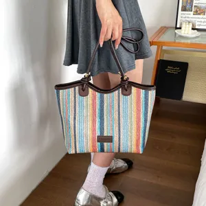 Colorful striped woven tote bag for women, large capacity casual straw shoulder bag for daily use.